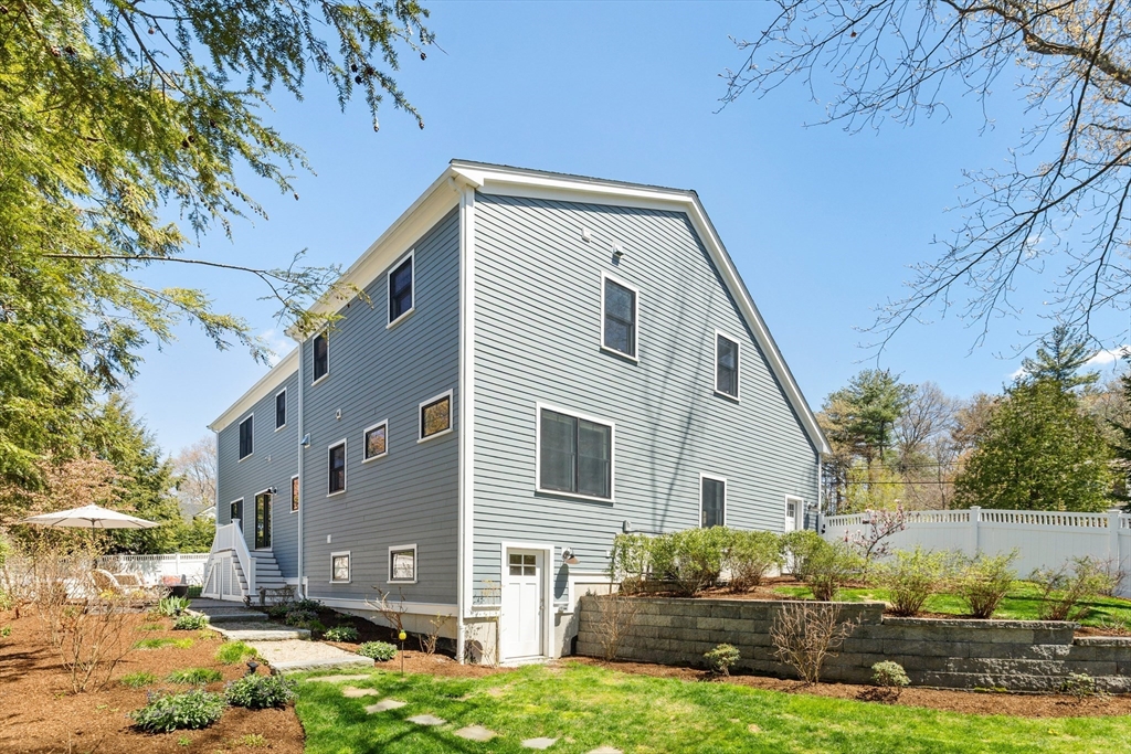 24 Pine Knoll Road Lexington, MA 02420 - Photo 40 of 41 a view of a house with a yard