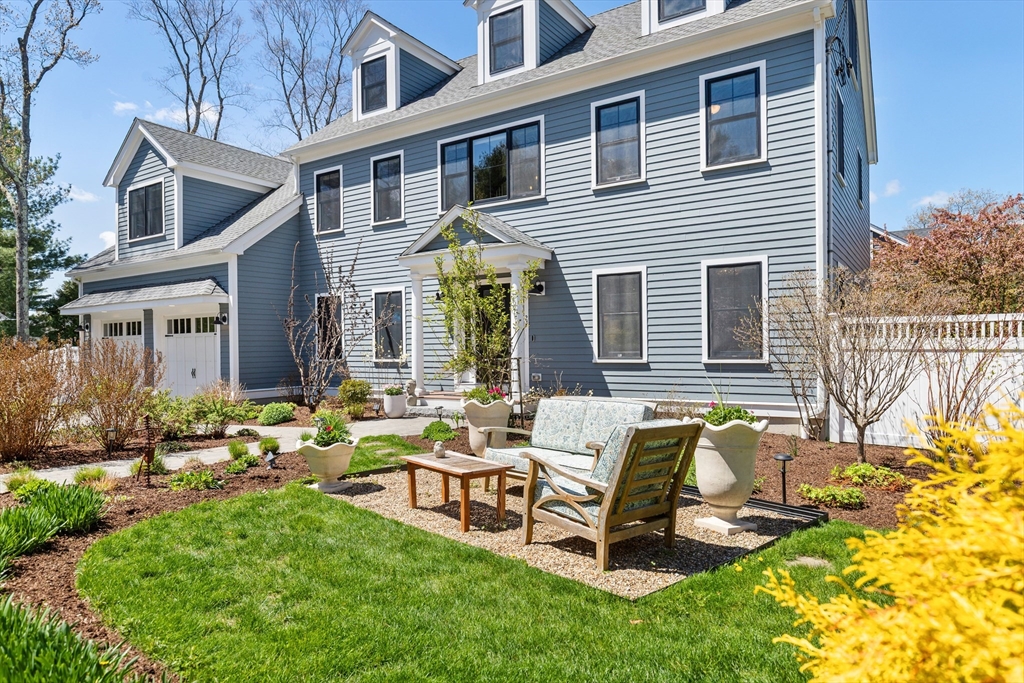 24 Pine Knoll Road Lexington, MA 02420 - Photo 41 of 41 a front view of a house with swimming pool