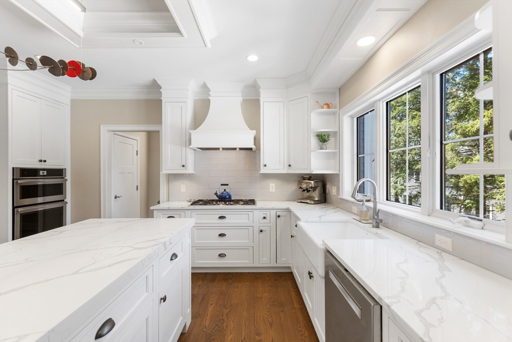 24 Pine Knoll Road Lexington, MA 02420 - Photo 6 of 41 a kitchen with granite countertop a sink stainless steel appliances and window