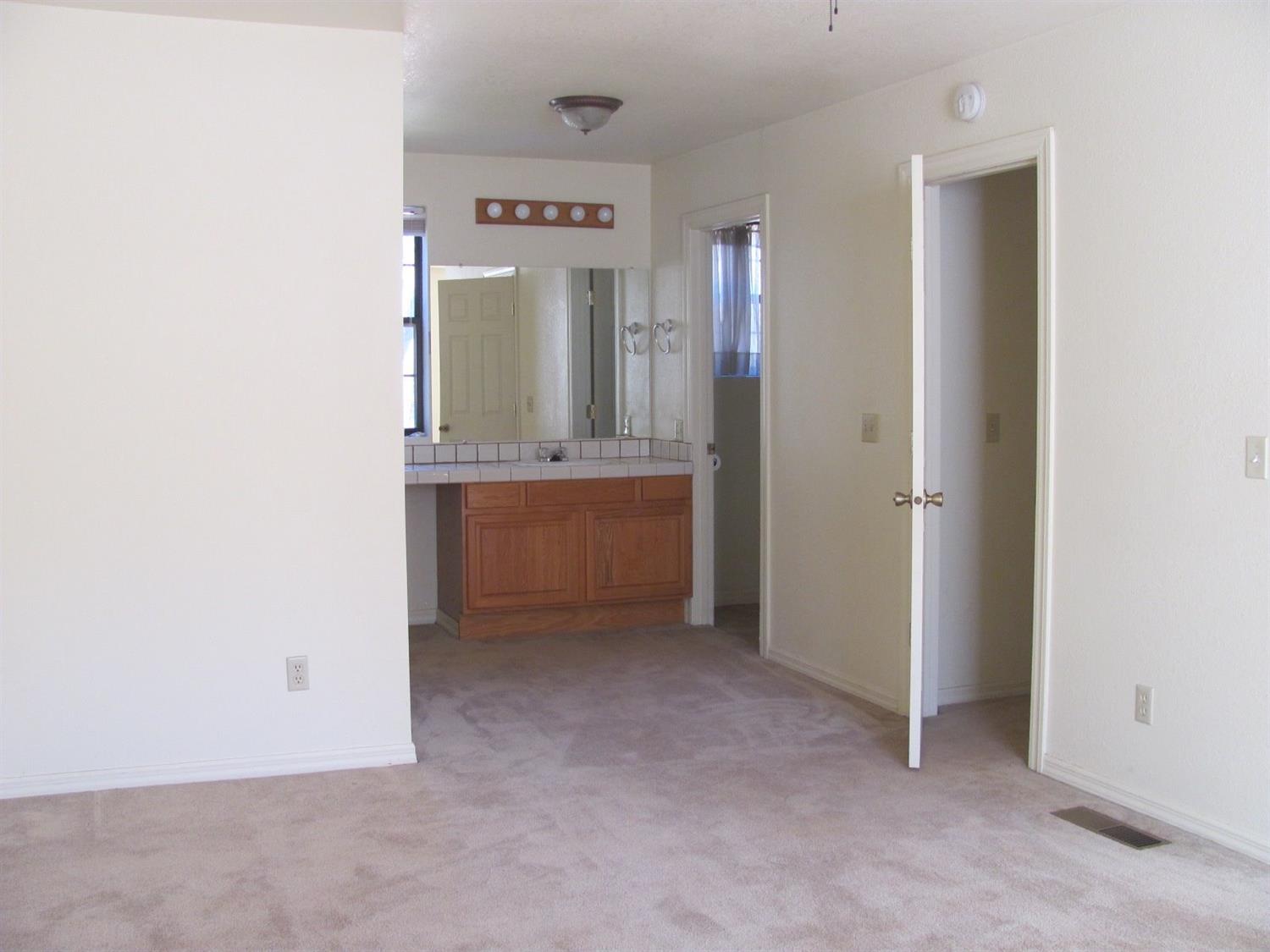 460 Kirkham Road Cave Junction, OR 97523 - Photo 12 of 30 Upstairs master bedroom toward sink, bat