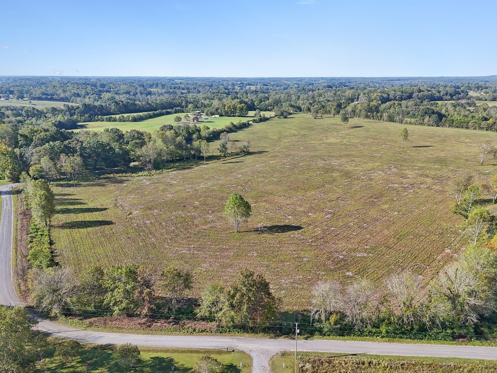 1 7 Springs Road Smithville, TN 37166 - Photo 11 of 19 a view of a lake with a mountain in the background