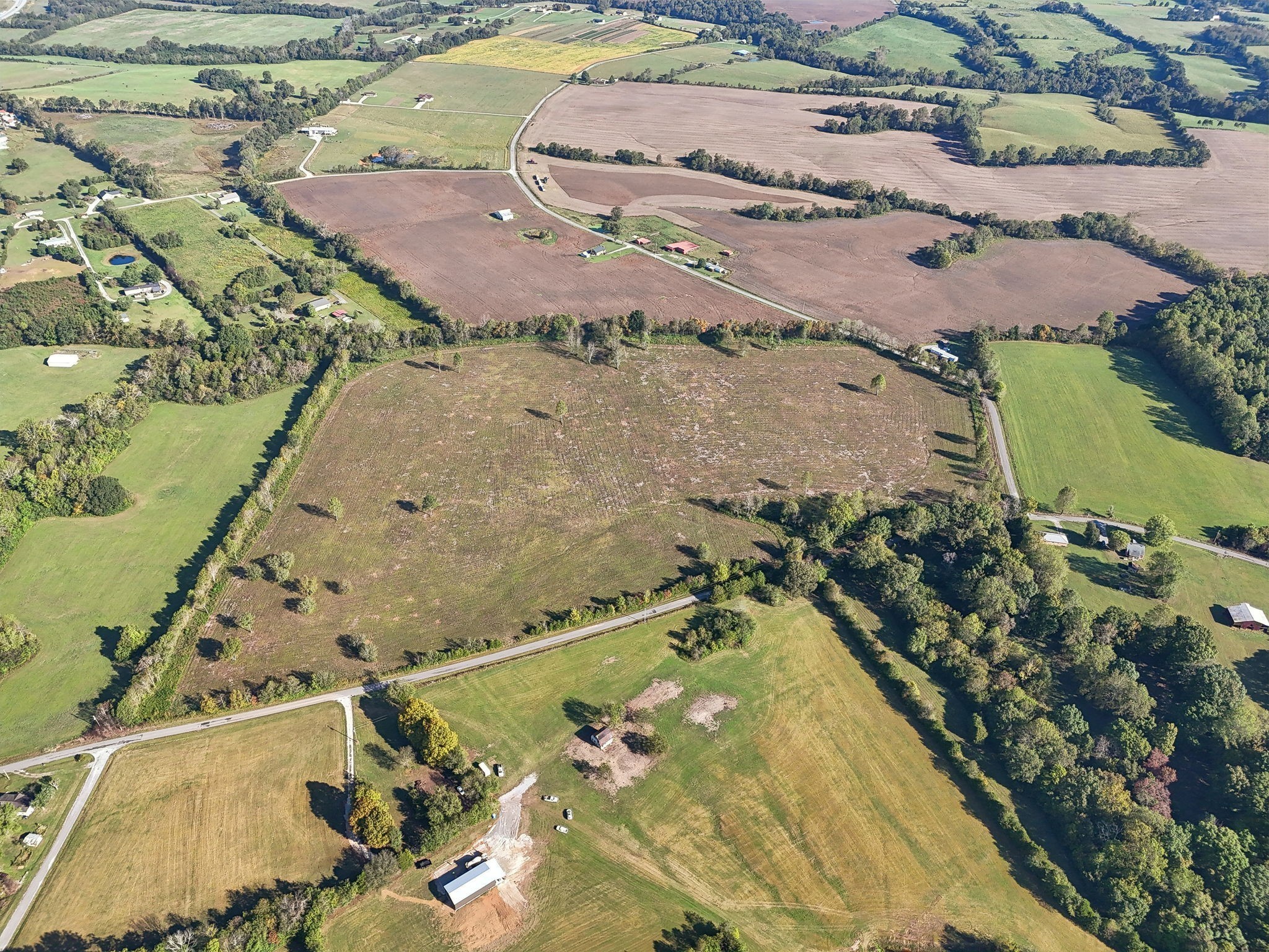 1 7 Springs Road Smithville, TN 37166 - Photo 15 of 19 an aerial view of a house with a yard and lake view