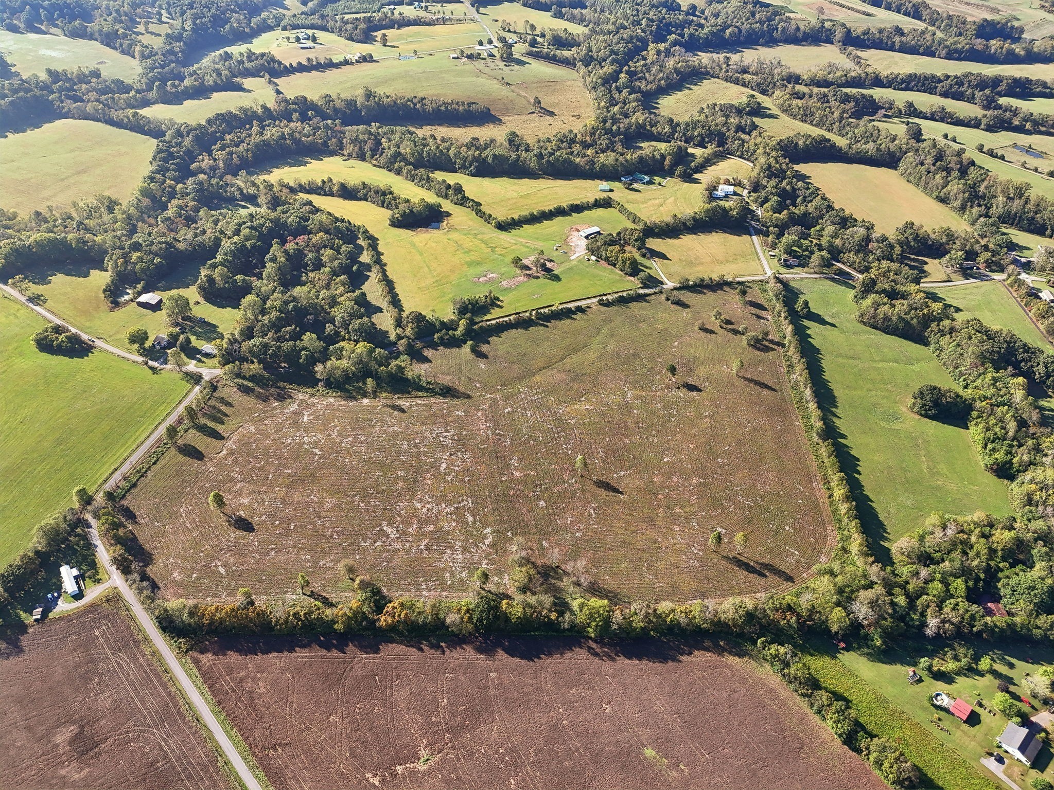 1 7 Springs Road Smithville, TN 37166 - Photo 3 of 19 an aerial view of a house with a yard and ocean view
