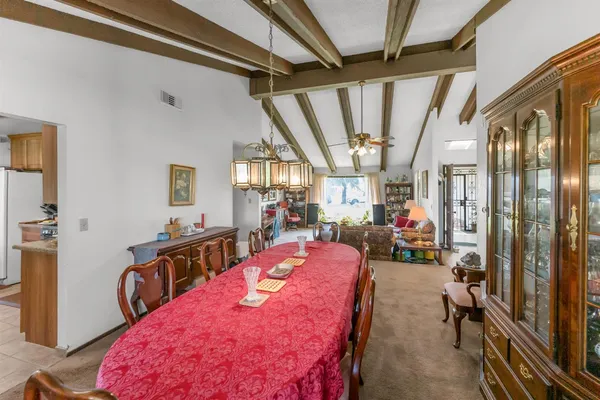 a view of a dining room with furniture