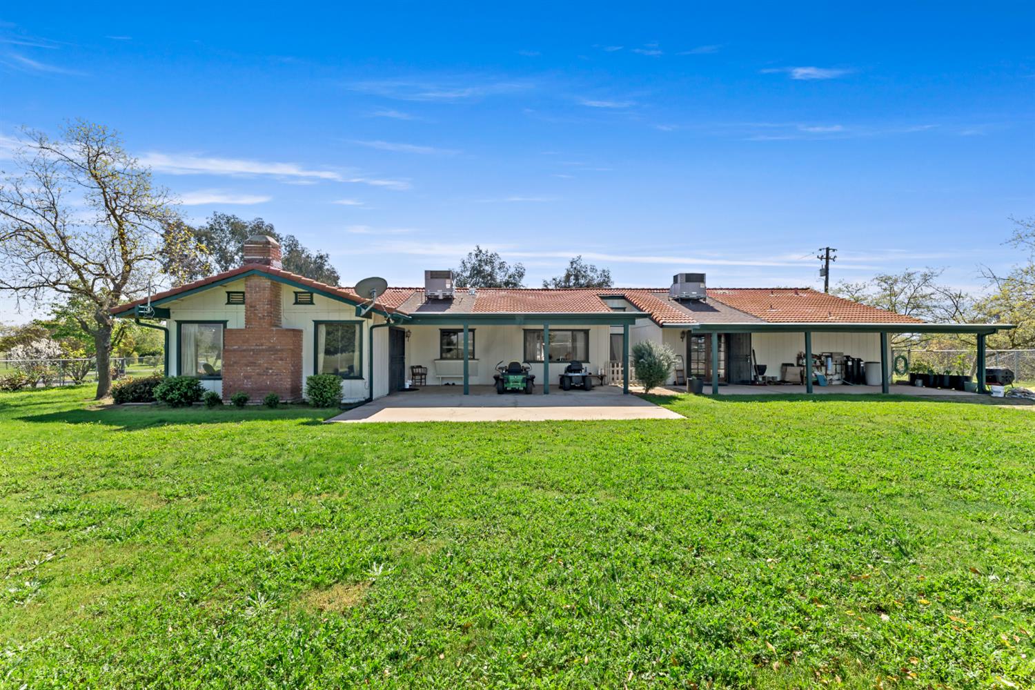 4776 Stetson Road Clovis, CA 93619 - Photo 41 of 49 a aerial view of a house with a big yard and large trees