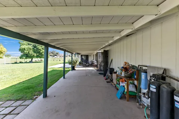 a view of a storage room with furniture and a garage