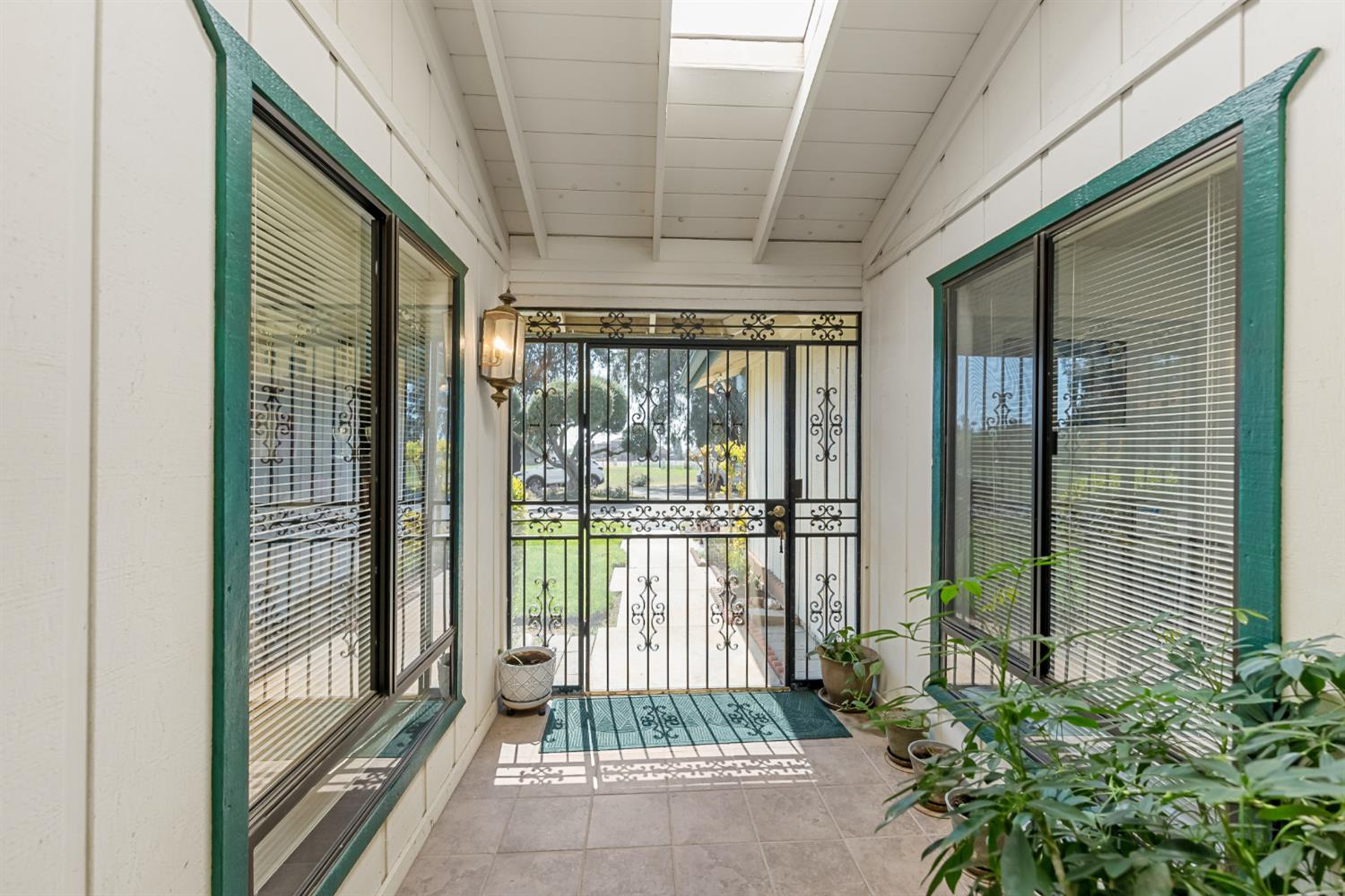 4776 Stetson Road Clovis, CA 93619 - Photo 8 of 49 a view of a room with large windows