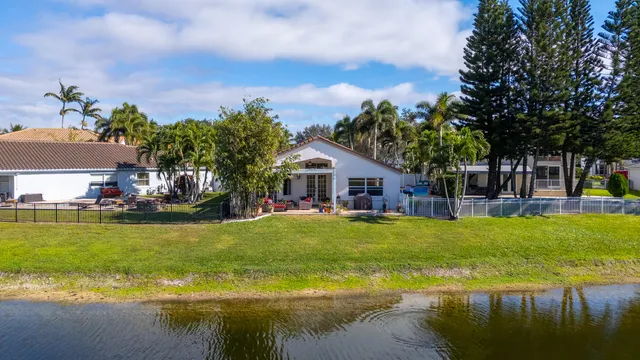 an aerial view of a city with lots of residential buildings ocean and ocean view