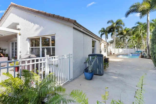 an aerial view of a house with a lake view