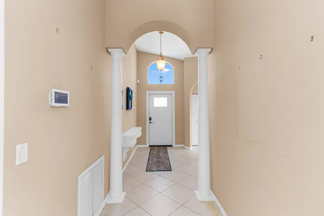 a bathroom with a bathtub shower sink vanity and toilet