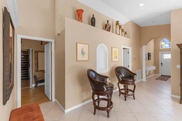 a kitchen with a sink cabinets and window