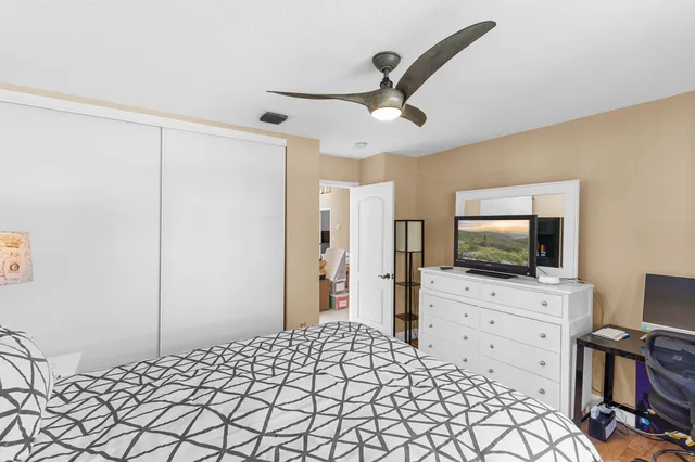 a kitchen with a sink cabinets and stainless steel appliances
