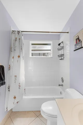 a view of a livingroom with furniture and hardwood floor