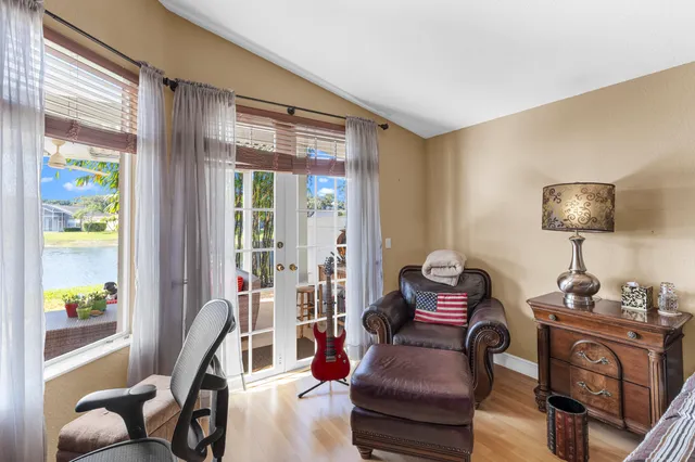 an aerial view of a pool patio yard and outdoor seating