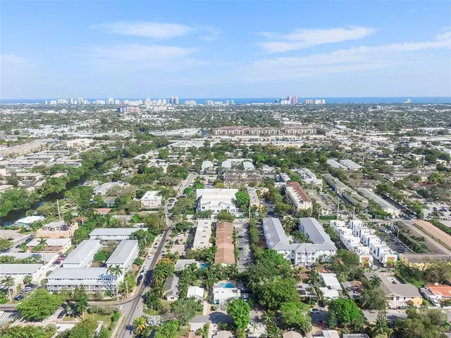 a view of a car parked in front of a house