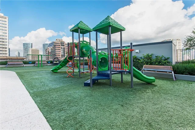 a view of a table and chairs in the garden