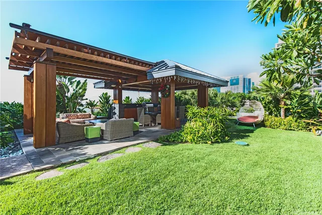 a backyard of a house with seating space