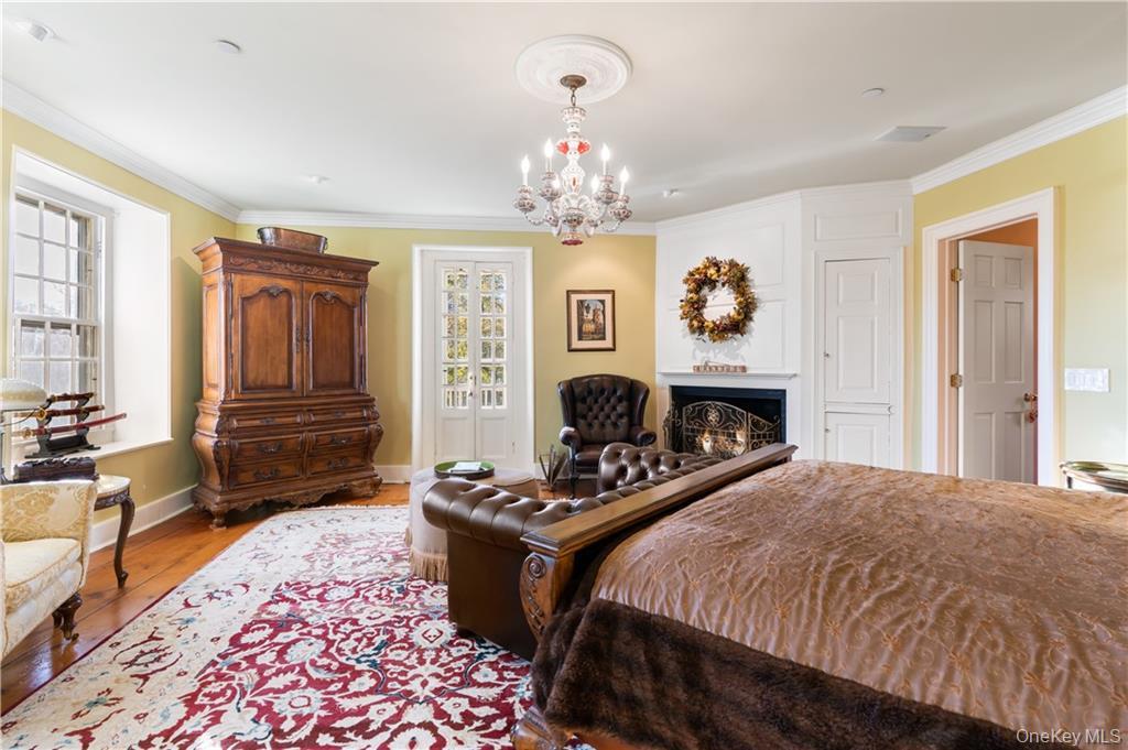 11 Brown Road Pleasant Valley, NY 12569 - Photo 16 of 26 a bedroom with furniture fireplace and window
