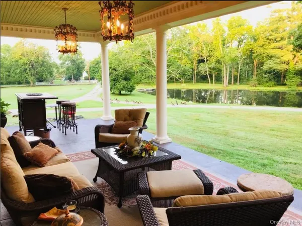 a outdoor living space with furniture and garden view