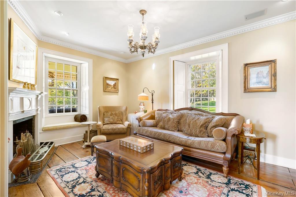 11 Brown Road Pleasant Valley, NY 12569 - Photo 8 of 26 a living room with furniture fireplace and window