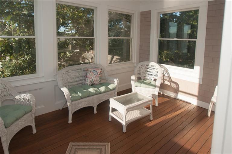 429 Monomoscoy Road Mashpee, MA 02649 - Photo 21 of 26 a living room with furniture and a window