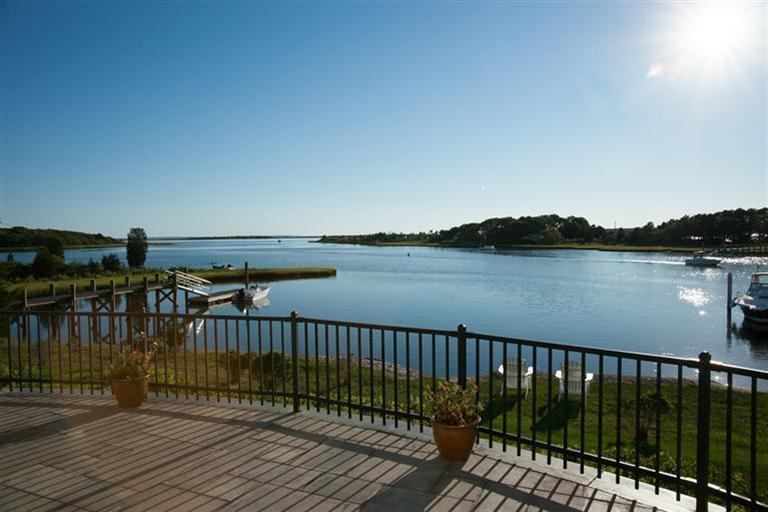429 Monomoscoy Road Mashpee, MA 02649 - Photo 26 of 26 a balcony with wooden floor