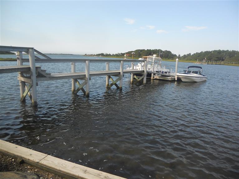 429 Monomoscoy Road Mashpee, MA 02649 - Photo 4 of 26 a view of a lake