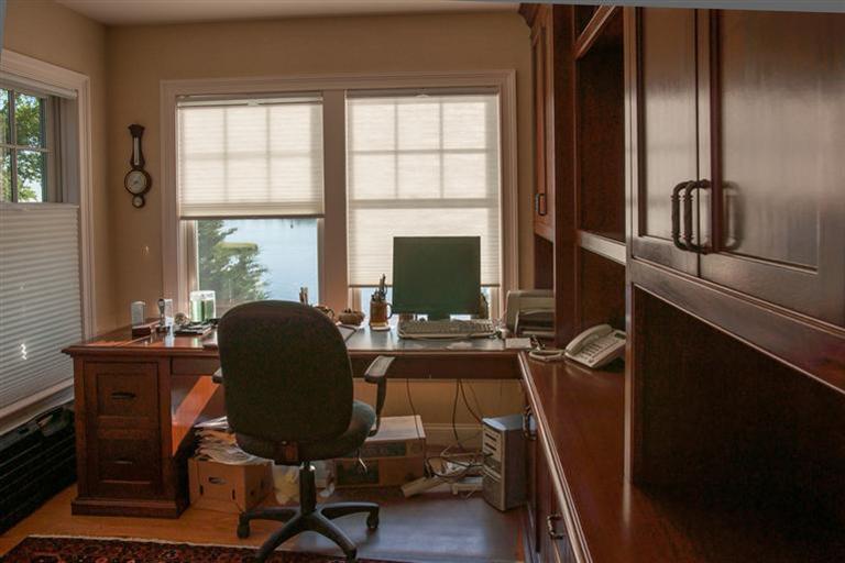 429 Monomoscoy Road Mashpee, MA 02649 - Photo 10 of 26 a view of a workspace with furniture and a window