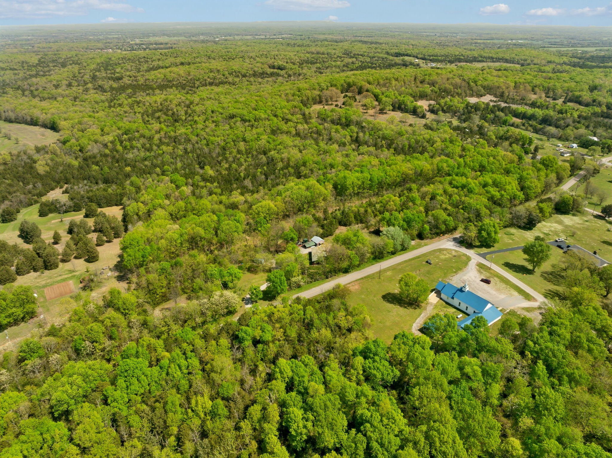 1716 South Berlin Road Lewisburg, TN 37091 - Photo 3 of 78 a view of a field with an ocean view