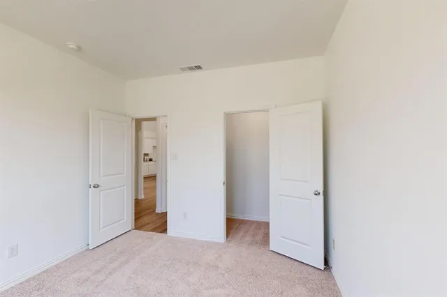 an empty room with closet