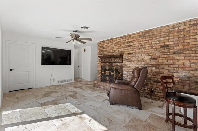 a view of a livingroom with furniture
