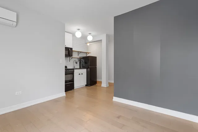 a view of a kitchen with a sink