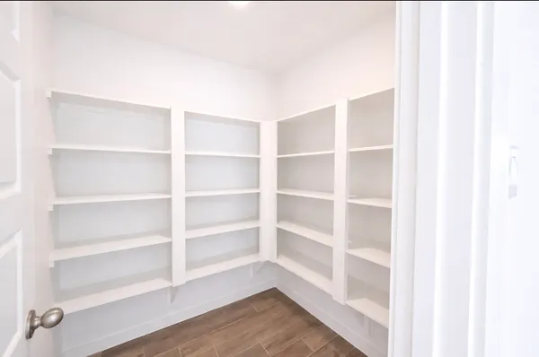 a view of an empty room with empty racks