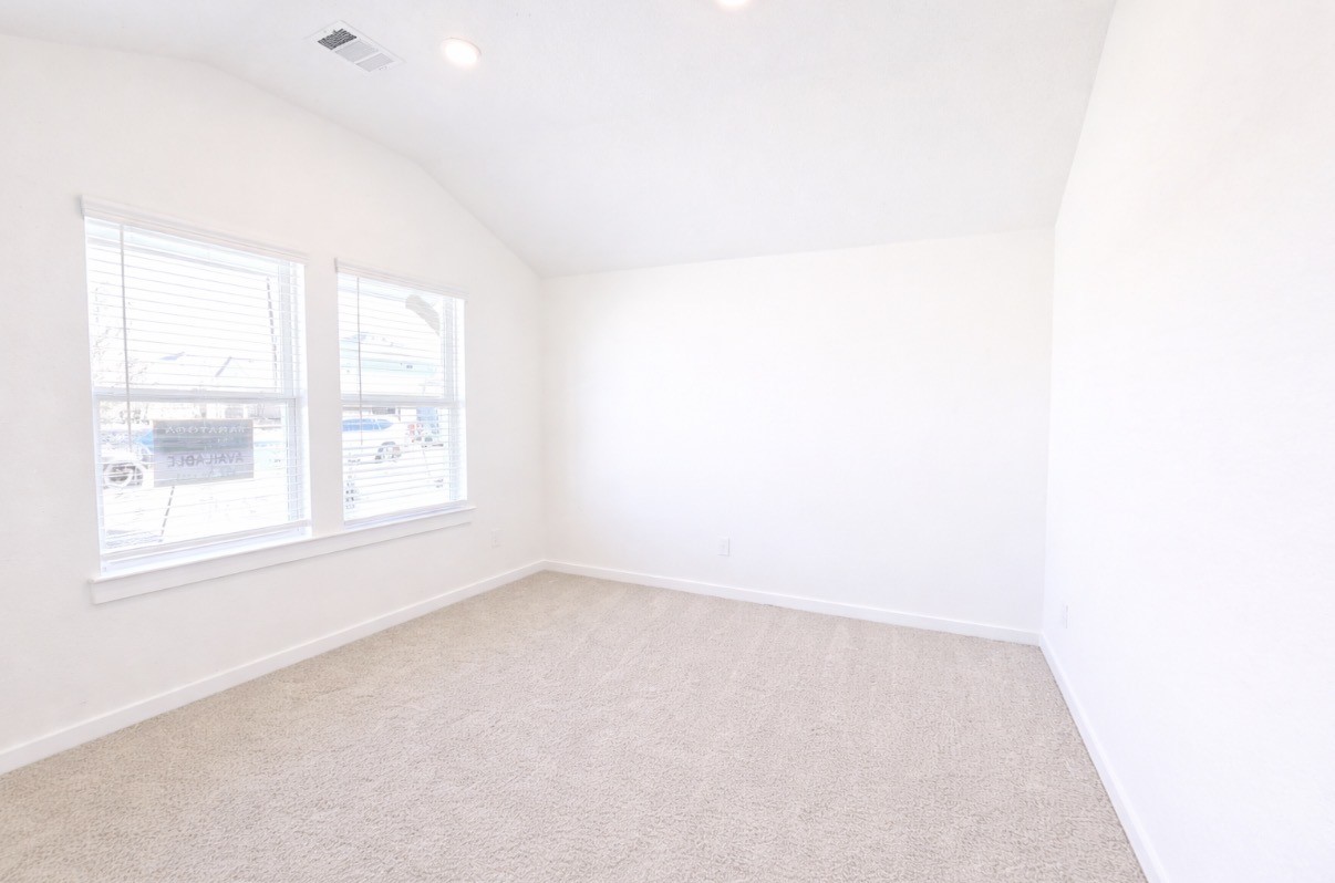 8315 Amber Summit Lane Angleton, TX 77515 - Photo 16 of 21 an empty room with a window