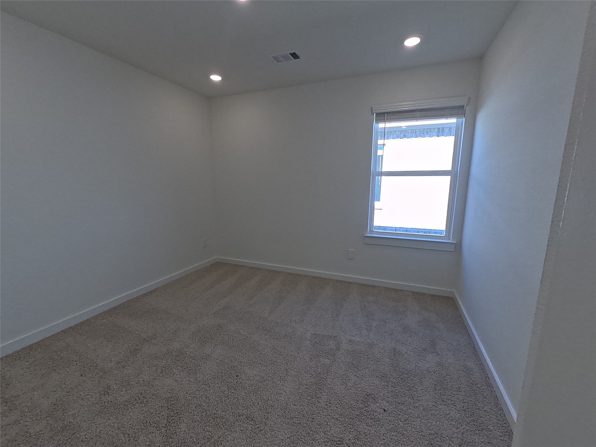 8315 Amber Summit Lane Angleton, TX 77515 - Photo 4 of 21 an empty room with a window