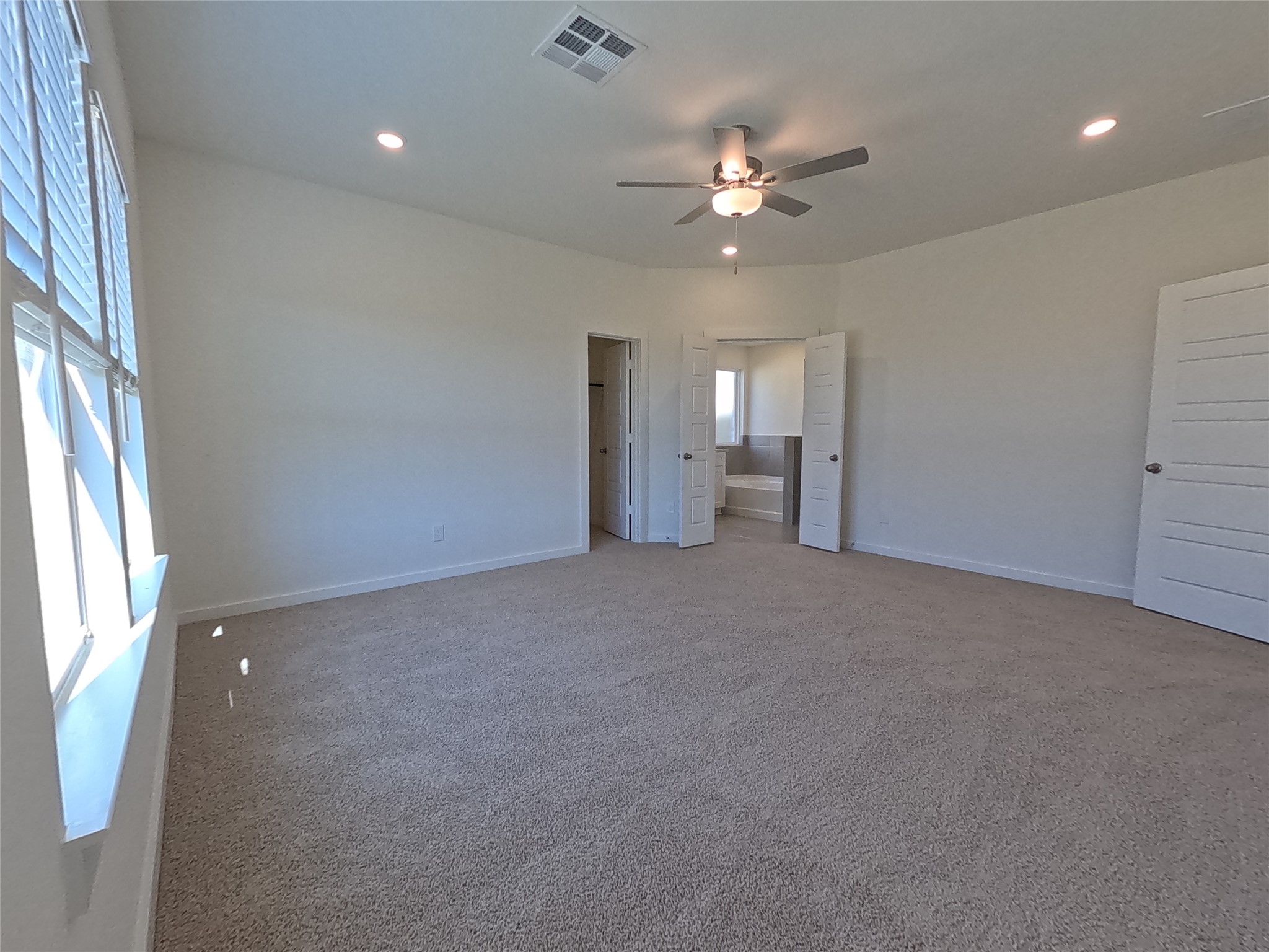 8315 Amber Summit Lane Angleton, TX 77515 - Photo 8 of 21 a view of an empty room with a window
