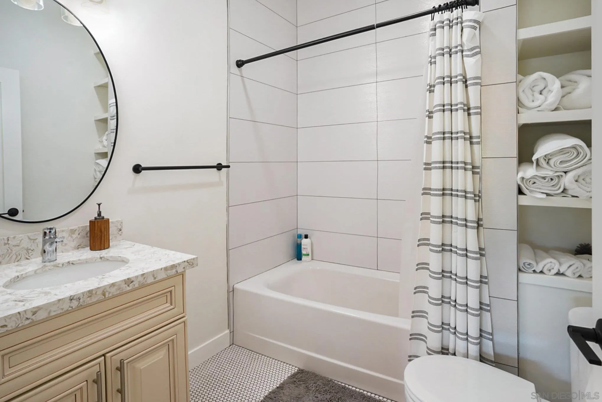 2020 3rd Street Julian, CA 92036 - Photo 14 of 34 a bathroom with a sink toilet vanity and shower