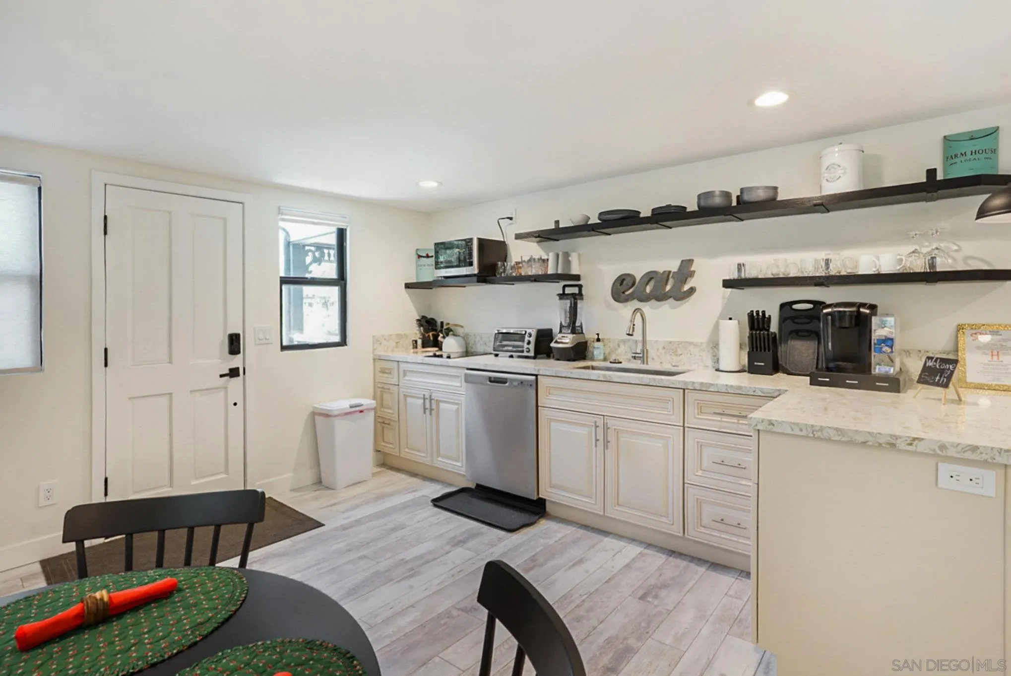 2020 3rd Street Julian, CA 92036 - Photo 16 of 34 a kitchen with granite countertop a sink cabinets and window