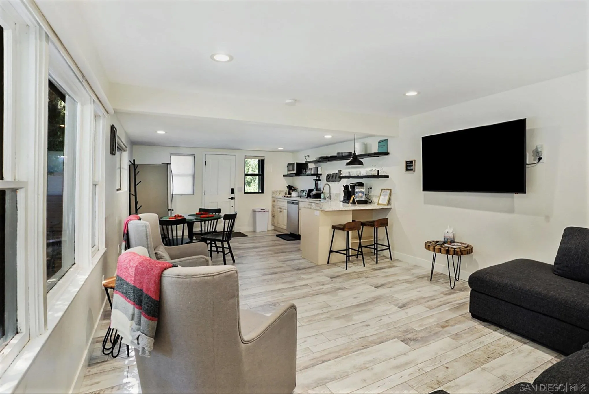 2020 3rd Street Julian, CA 92036 - Photo 18 of 34 a living room with furniture and a flat screen tv