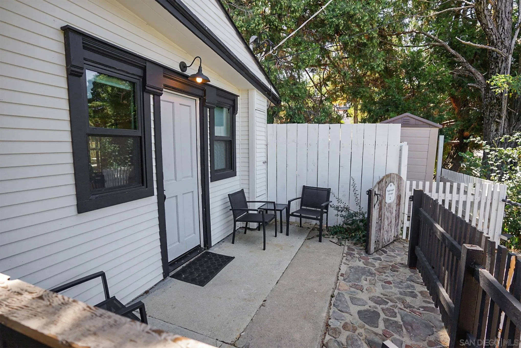 2020 3rd Street Julian, CA 92036 - Photo 28 of 34 a view of a dinning table and chairs in patio of the house