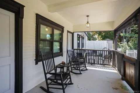 a view of a porch with furniture