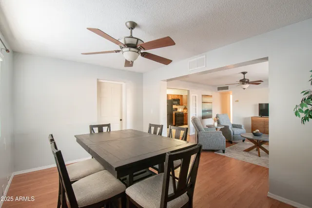 a view of a dining room with furniture