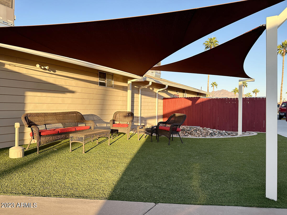 2605 South Tomahawk Road, Unit 58 Apache Junction, AZ 85119 - Photo 25 of 29 RD OUTSIDE SITTING AREA
