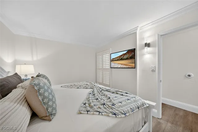 a bathroom with a granite countertop sink a mirror and a bathtub