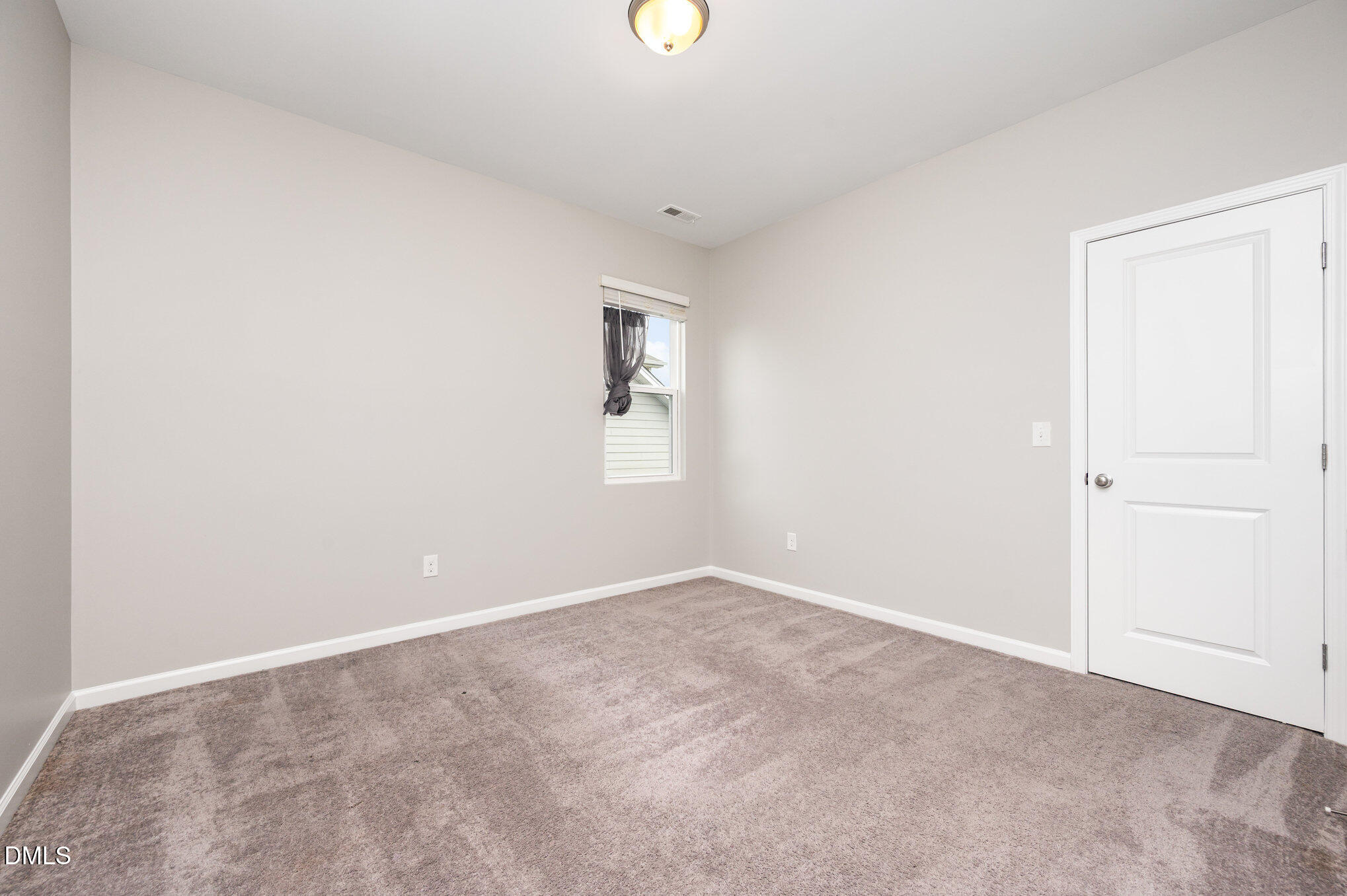 18 Dover Ridge Court Chapel Hill, NC 27517 - Photo 32 of 40 a view of an empty room with a window