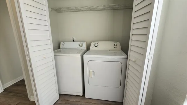 a utility room with dryer and washer