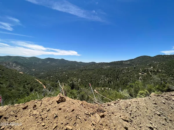 a view of a mountain with a outdoor space