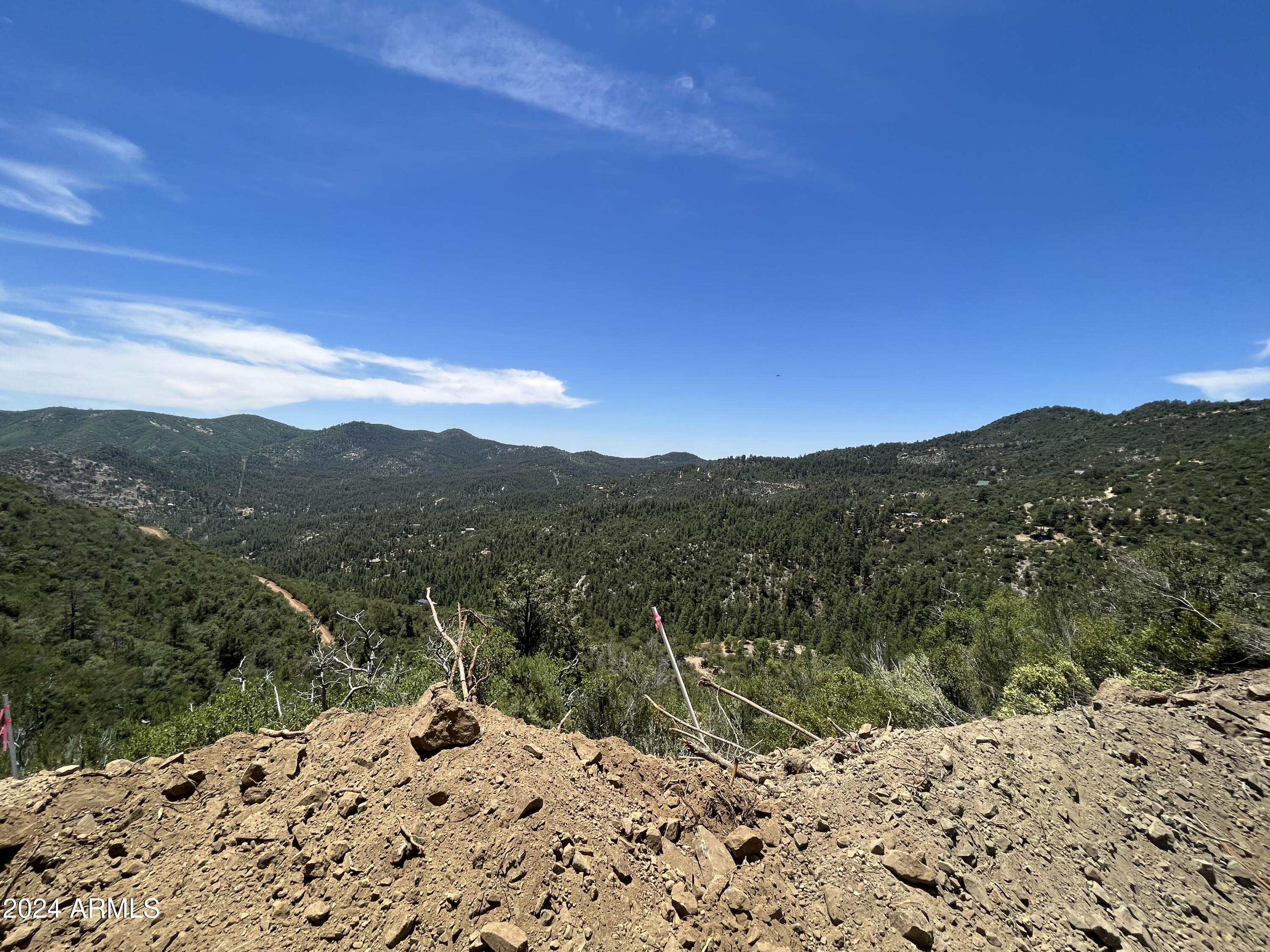 a view of a mountain with a outdoor space