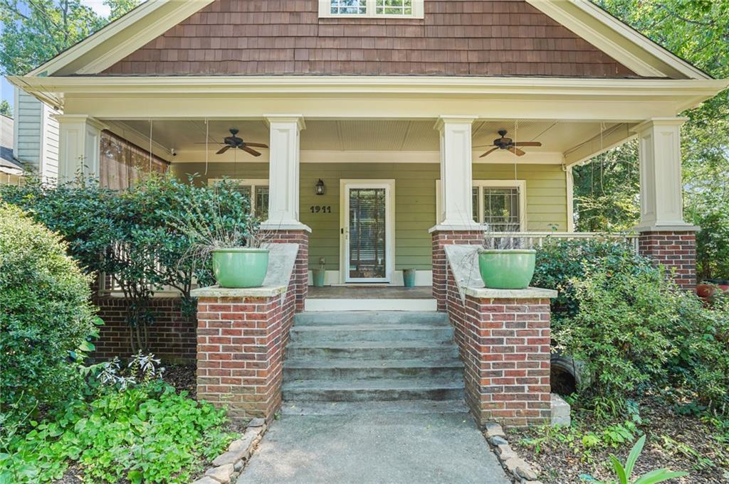1911 Hallman Street Northeast Atlanta, GA 30317 - Photo 1 of 1 front view of a house with a porch