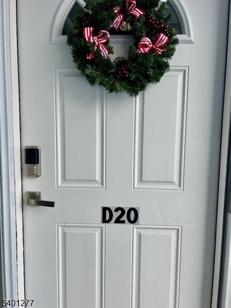 2350 State Route 10, Unit 20 Morris Plains, NJ 07950 - Photo 2 of 13 a vase of flowers sitting on a white shelf